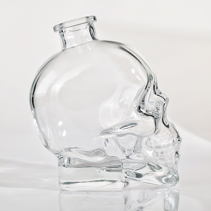 Wholesale premium 750ml unique empty engraved glass bottle for rum
