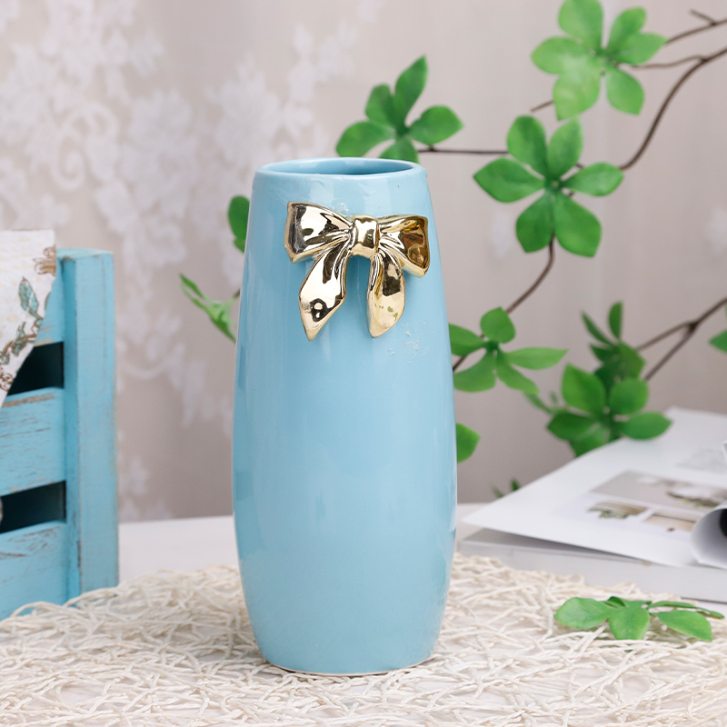 Redeco Popular Design Creative Elegant Blue Cylinder Vase With Golden Bow Custom Ceramic Vase For Hotel Home Office Decoration