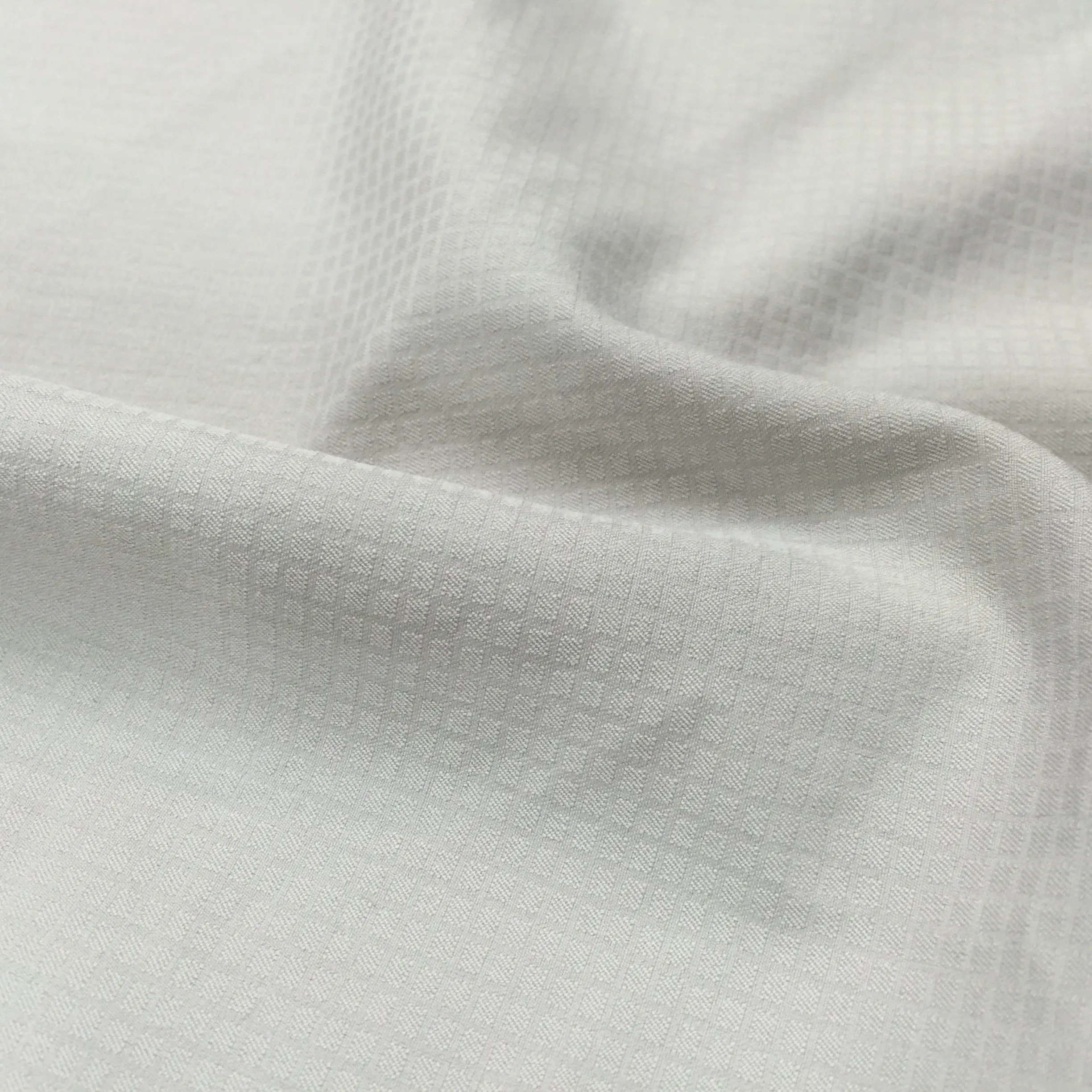 China Professional Manufacture Recycled Polyester Jacquard Check 4 Way Stretch Fabric With Wicking Function For Cloth