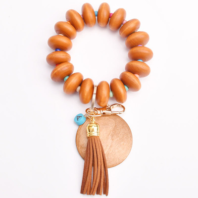 Hot Selling Bohemia Amazon Summer Silicone Elastic Charm Wood Beads Leather Tassel Charm Keychain Bracelet