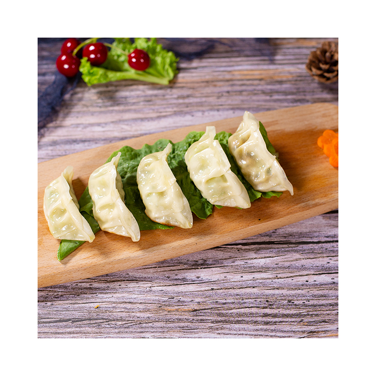 Китайские традиционные вкусные приготовленные замороженные овощи, жареные пельмени