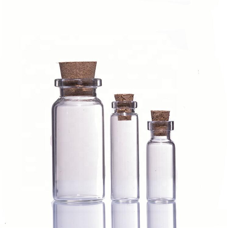 Free sample 1ml 2ml 3ml 5ml 10ml 20ml 30ml 50ml 100ml e liquid essential oil small schering glass bottles with cork for sale