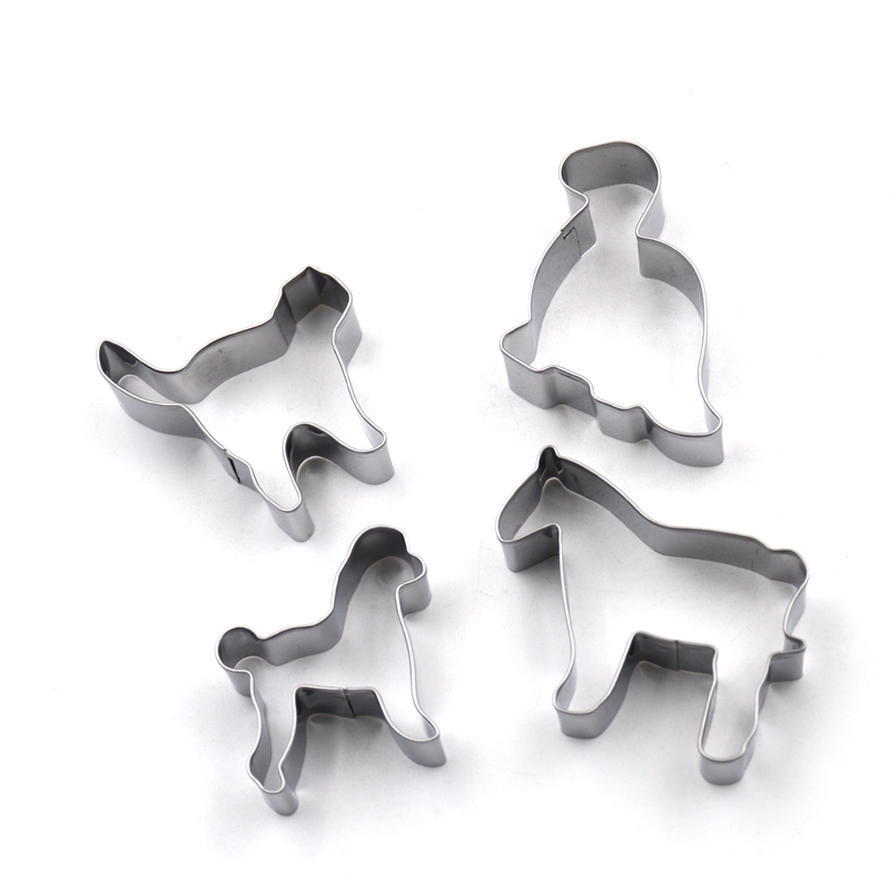 Stainless steel kitchen cake molds in the shape of elephants horses and dogs