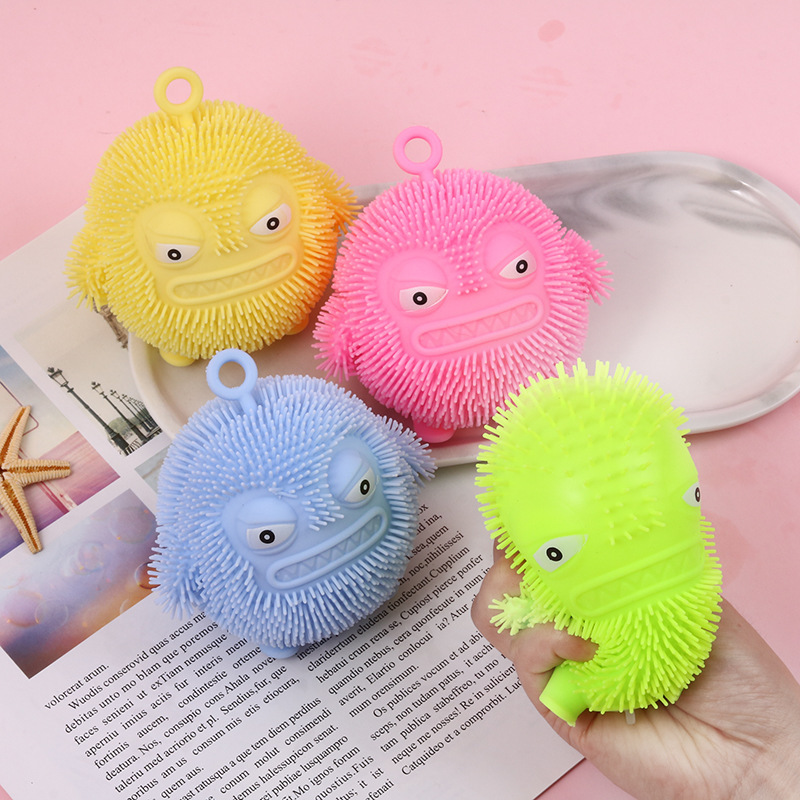 Wholesale Colorful Monster Designed Cartoon TPR Ball Toys Yoyo Flashing Puffer Ball squeeze toy