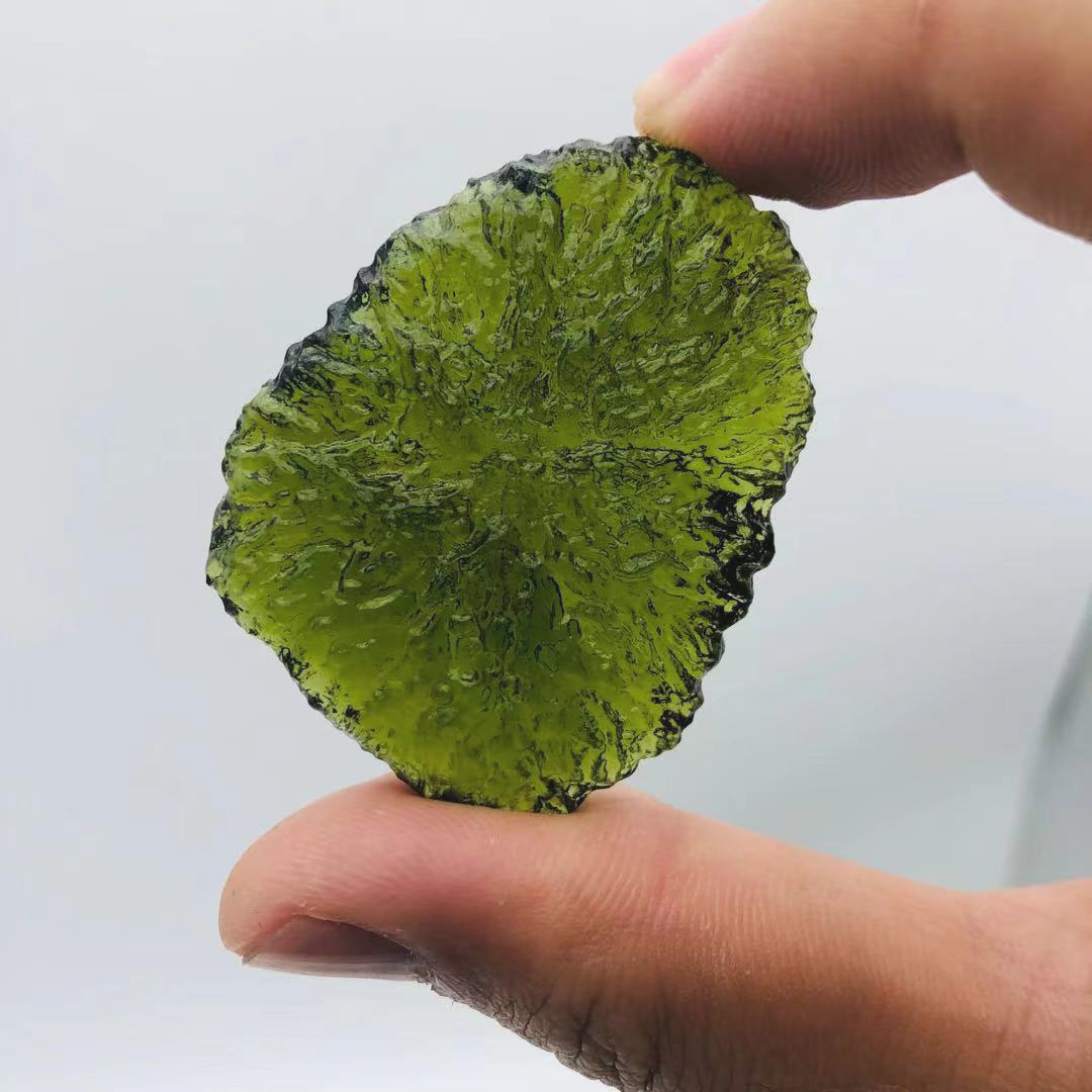 Rought Moldavite метеоролита грубой Tektite
