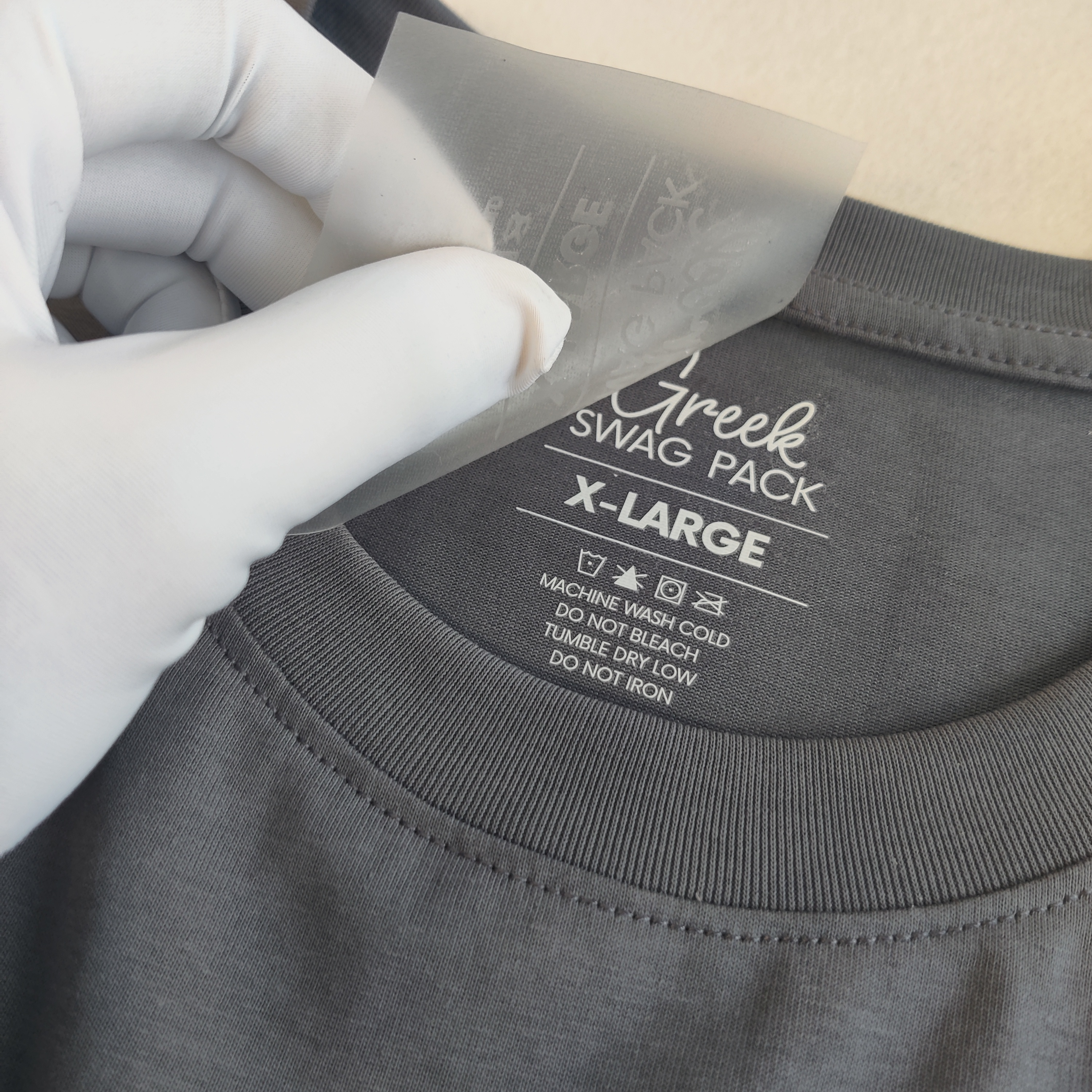 Custom Printed Logo Clothing Iron On Tagless labels, Wholesale Flexible Neck Size Wash Care Label Heat Transfer Clothes Label.
