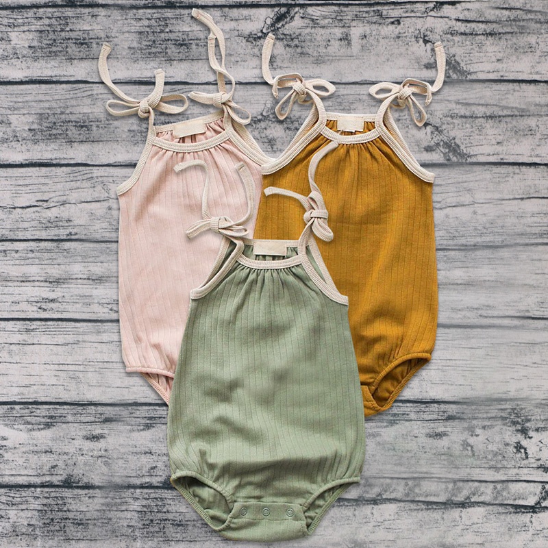Latest solid color tie strap ribbed cotton girl baby clothes romper