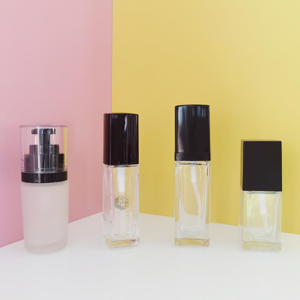 Premium 15 20 30 40 ml empty makeup liquid clear glass foundation bottle with black pump for cosmetics