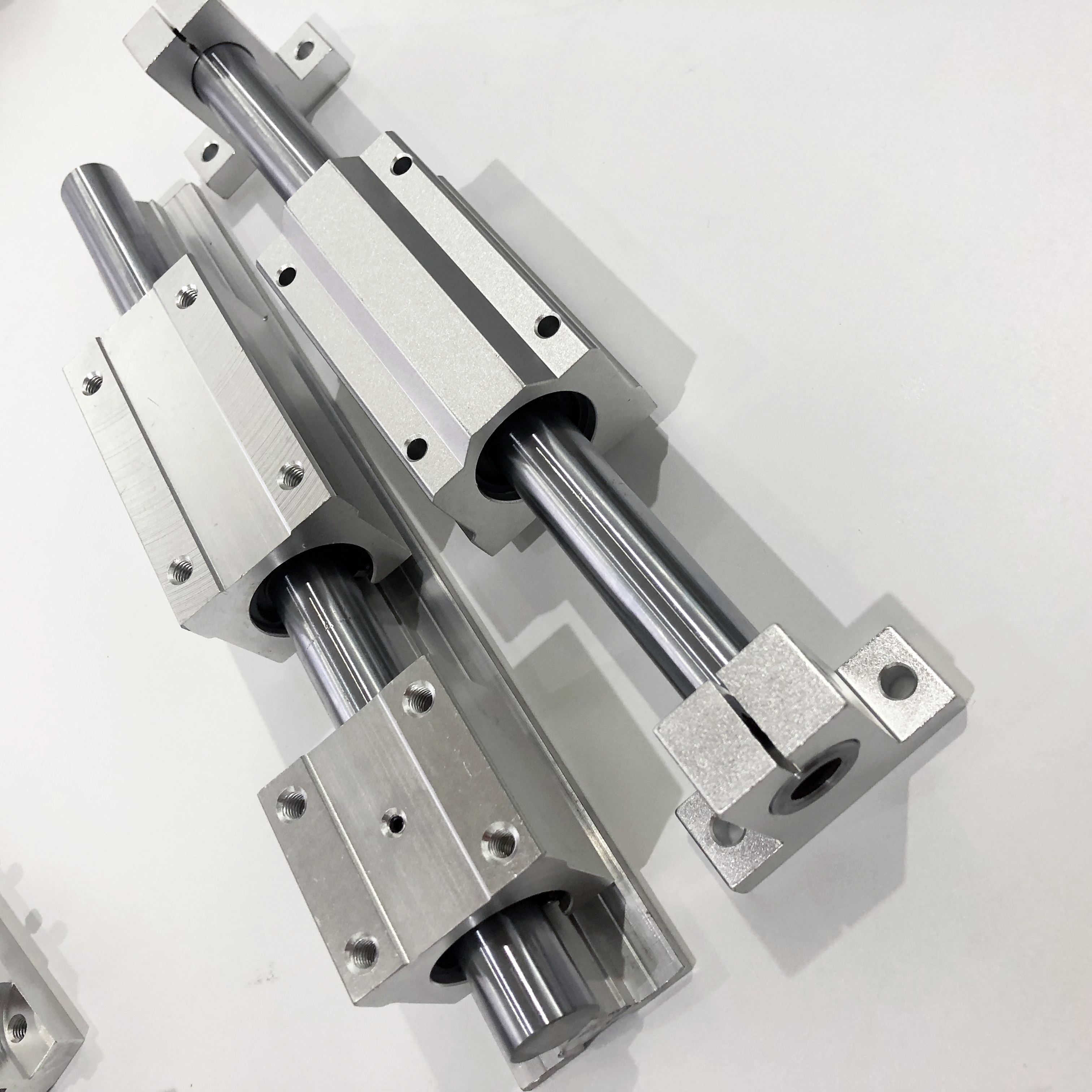 CNC алюминиевая круглая направляющая SBR10 12 16 20 25 30 35 40 50 и линейный скользящий блок SBR12UU