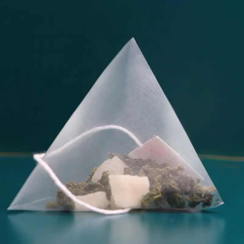 Export Tea Factory packing Disposable Different Size Heat Seal Biodegradable Tea Bags Triangle / Pyramid Corn Fiber Tea Bags