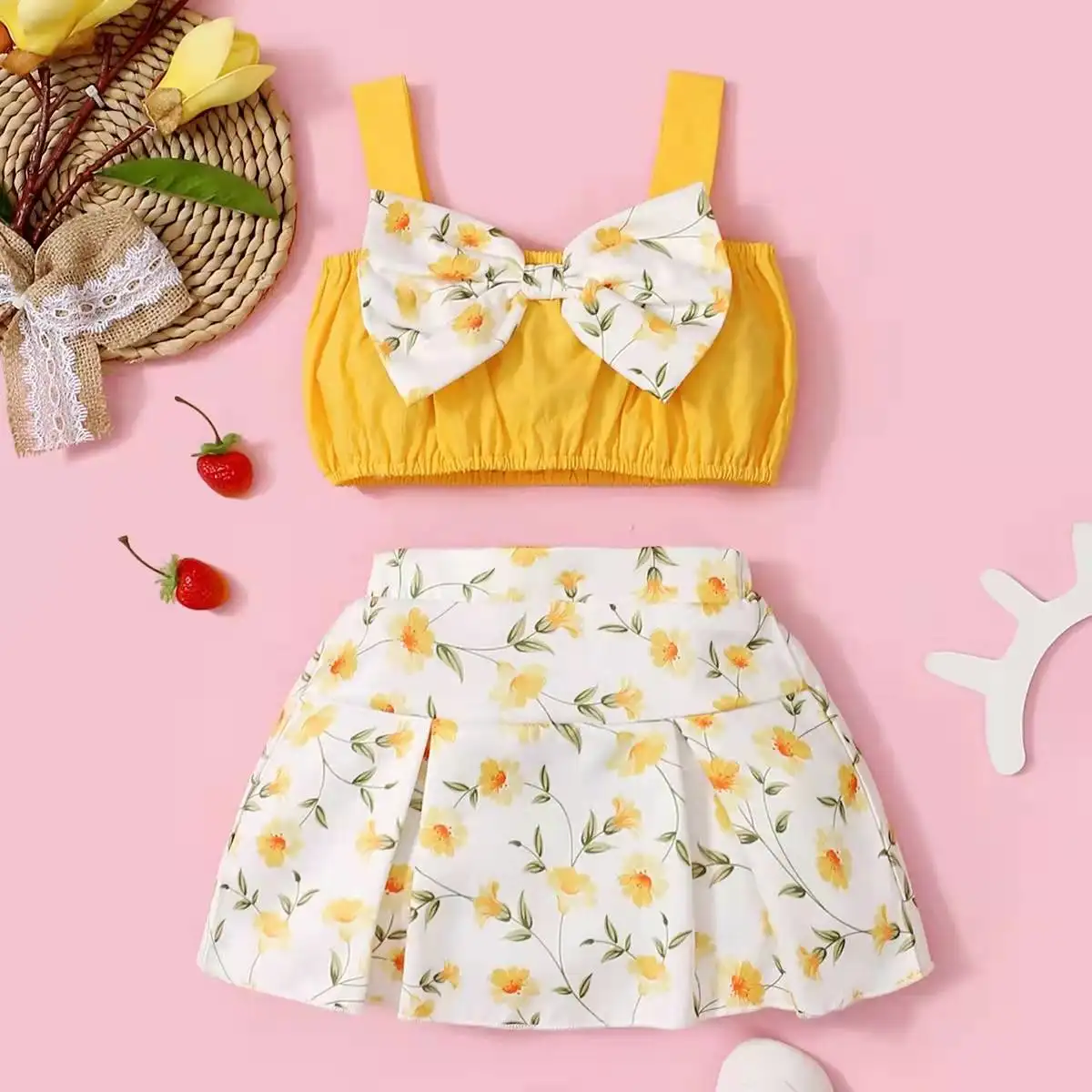 Factory sale girls summer 2022 new style fashion bow suspender top+floral skirt two pieces