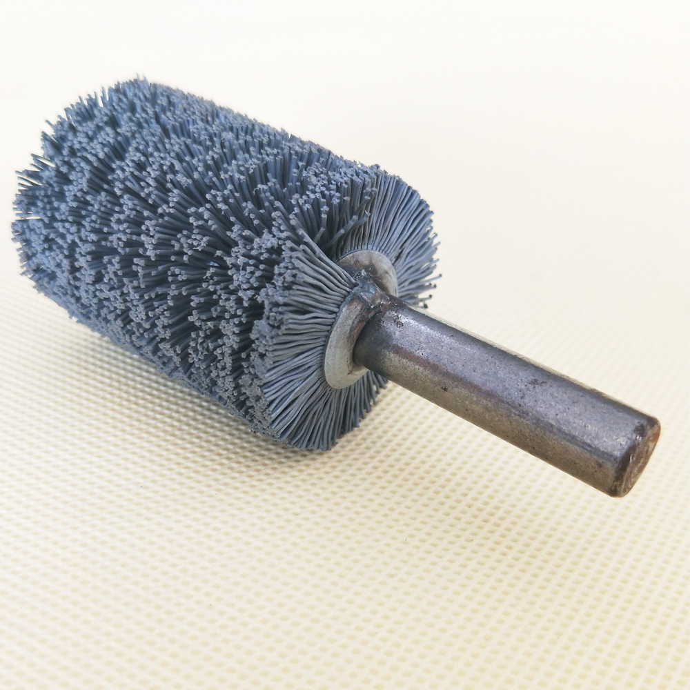 Brushes with shaft