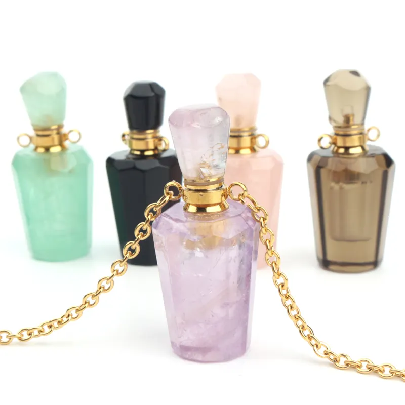 wholesale custom design natural rock crystal stone hand carved empty perfume bottle Oil Bottles