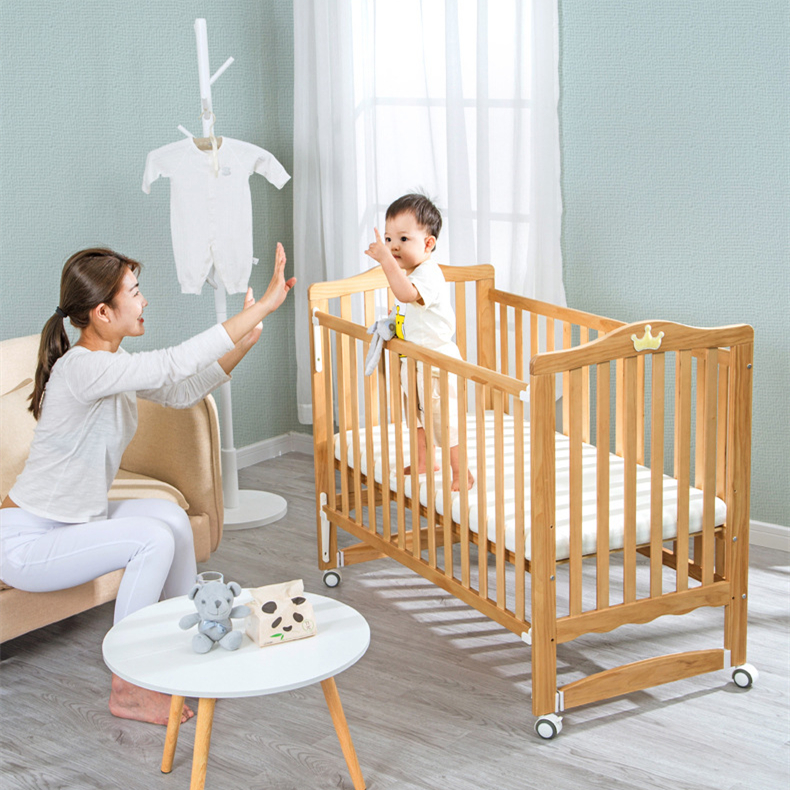 Solid wood crib Best selling solid pine wooden baby bed design/baby swing cot/baby crib attached adult bed
