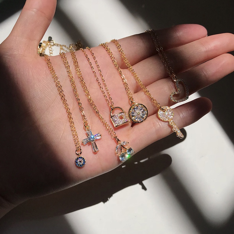 10% Off Шарм ювелирные изделия S925 стерлингового серебра 18K позолоченная цепочка, кольцо из циркона дьявольские глаза Хрустальное Сердце колье с подвеской в виде креста