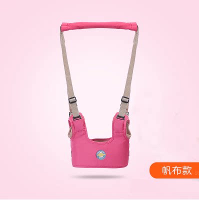 Baby learning to walk with the baby a child learning to walk from le artifact safety prevention traction on the rope