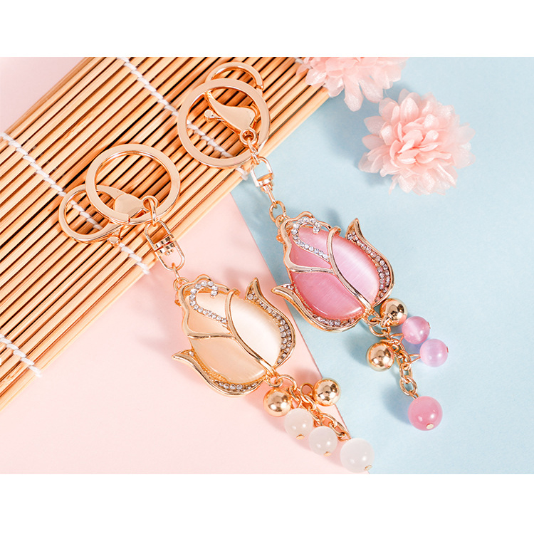 wholesale custom different shape materials rose key chains high quality crystal keyrings with logo