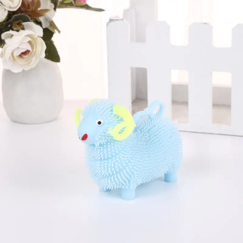 HEBEIER Wholesale LED Electronic Cartoon Flashing Animal TPR Soft Spiky Squeeze Expandable Ball Toys For Kids