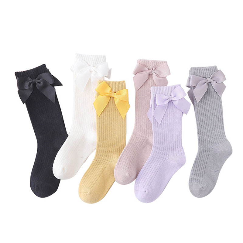 Hot selling cute casual solid colors wholesale socks knee high ruffle socks for kids