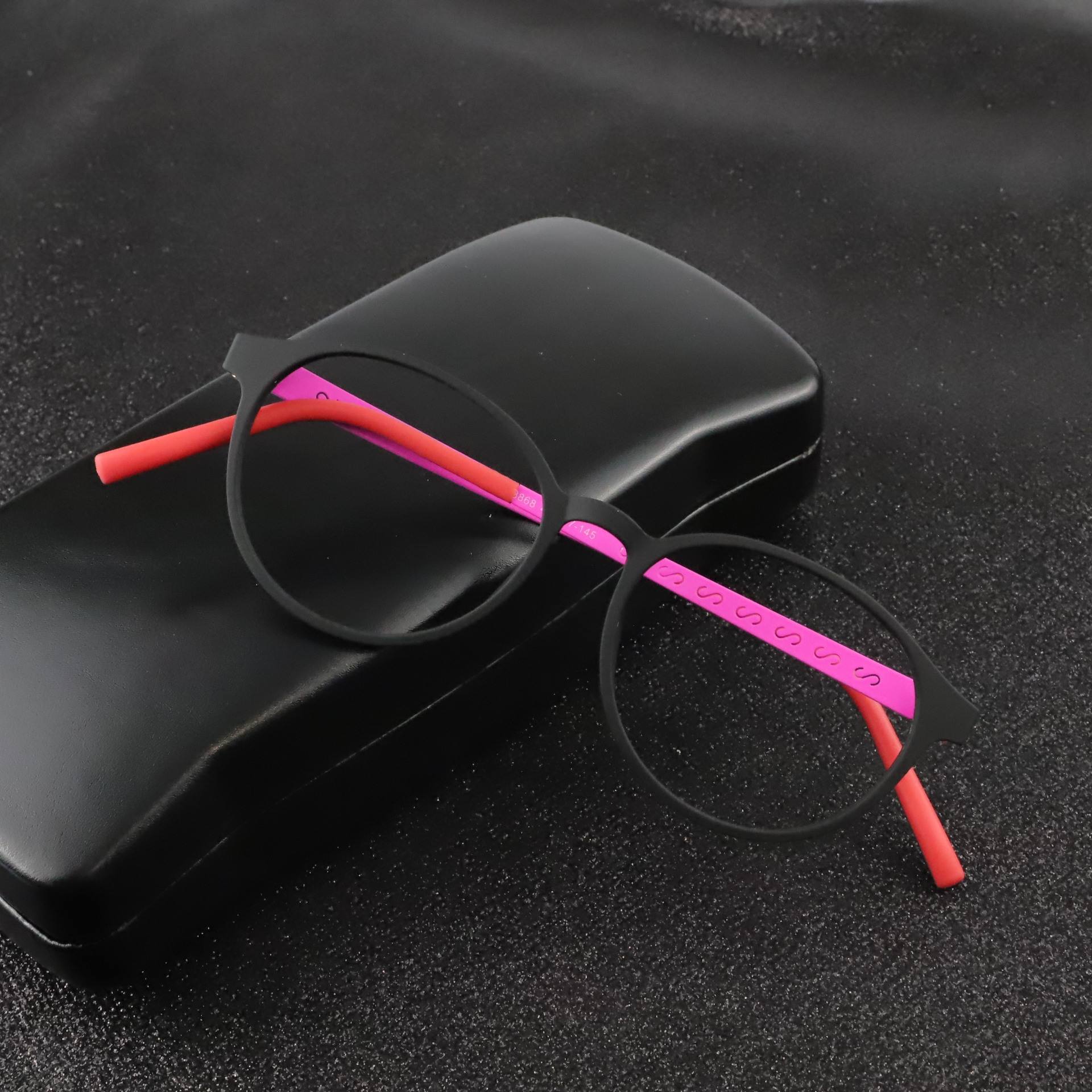 New retro round frame titanium light elastic paint texture sunglasses