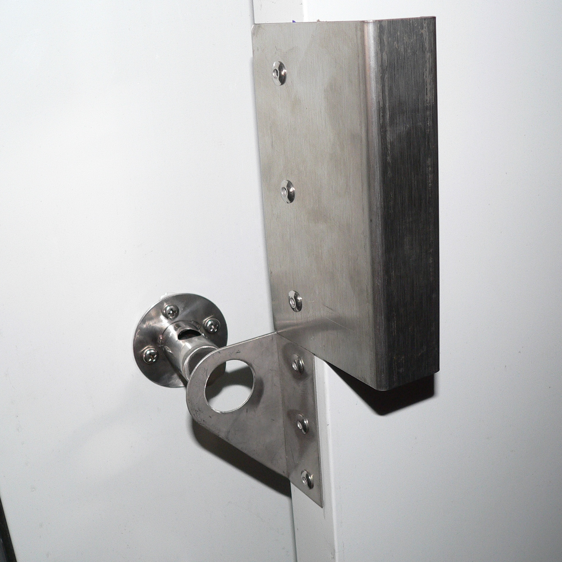 Door handle and locking pin for bagged ice storage freezer