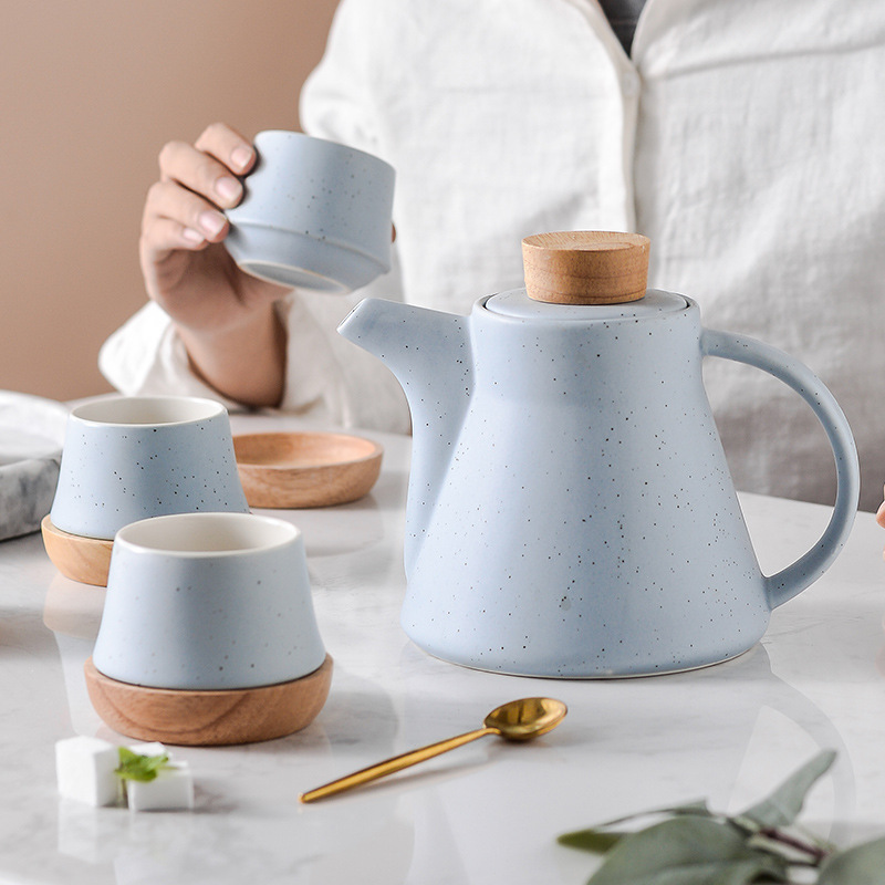 Porcelain Ceramic Teapot Set with 4 Cups & 4 Wooden Coasters with Food-grade Stainless Steel Infuser