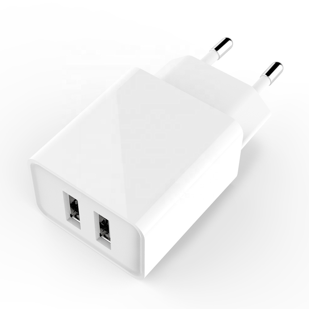 В Китае (стандарты CE, EMC/LVD/CB/по ограничению на использование опасных материалов в производстве сертифицированной, состоящий из универсального адаптера на 2 USB 5V 2.4A 12W адаптер сетевого зарядного устройства EU USA Зарядное устройство USB с вилкой 