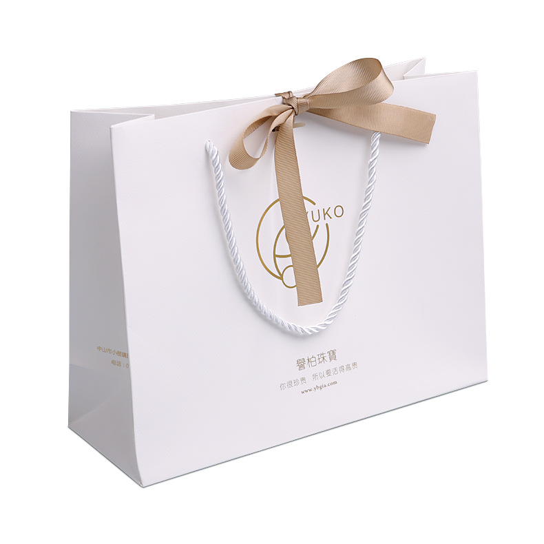 wholesale custom hot stamping foiled logo effect white paper bag with silk tape handle