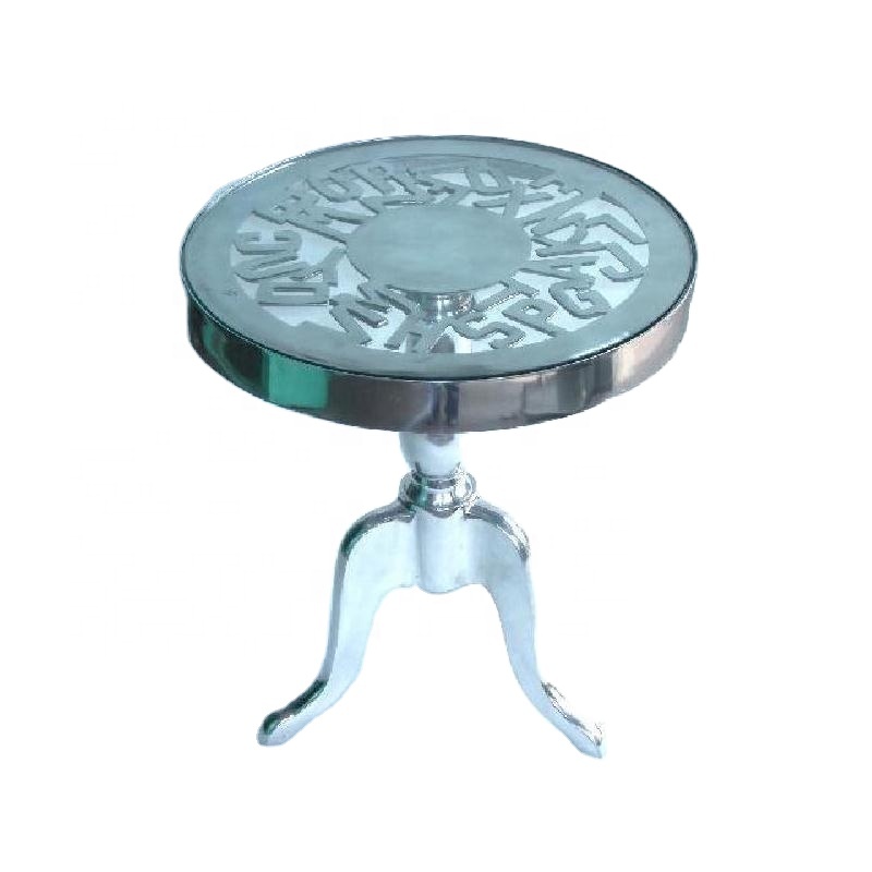 Cast Aluminium table in mirror polish alphabet design and glass top also available in rough finish