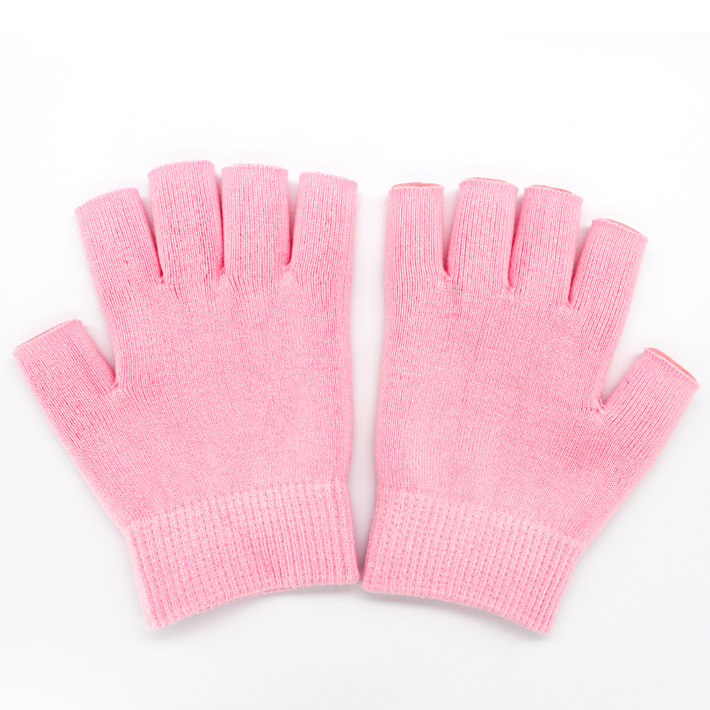 A pair of SPA plant essential oil gel skin care moisturizing fingerless gloves