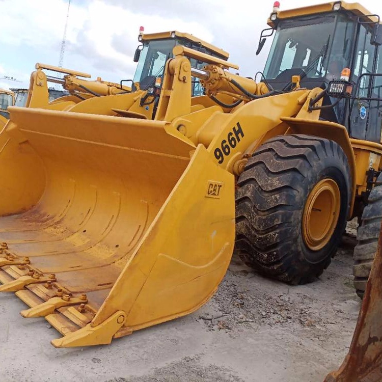 Подержанный колесный погрузчик Cat 966H 5 тонн на продажу