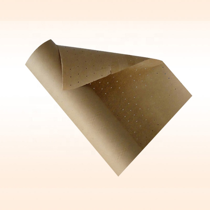 Brown perforated underlay kraft paper used in garment factory