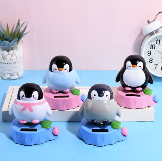 Custom logo 8 kinds of solar Dance Penguin toy system with small solar panel dancing toy car interior accessories