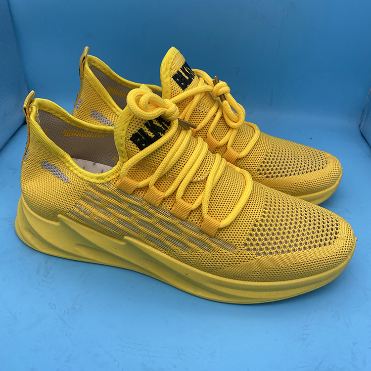 Wholesale promotion cheap price stock breathable trendy sports sneakers men women lightweight fly knit casual shoes