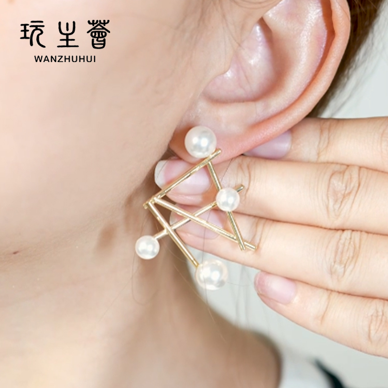 Unique gold plated sterling silver white pearl assymetrical earrings