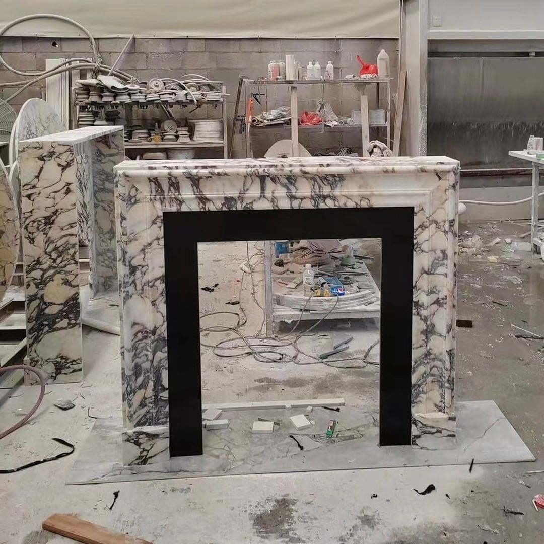 Natural Bulgari marble carved luxury custom living room fireplace