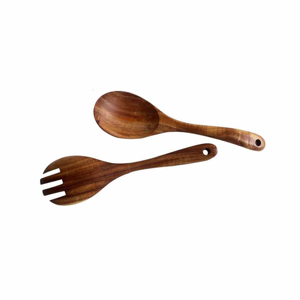 Salad tools. The modern wooden salad bowl set contains spoons and forks