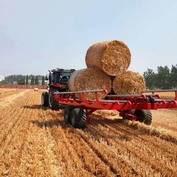Сельскохозяйственный трактор, прицеп для круглого захвата тюка