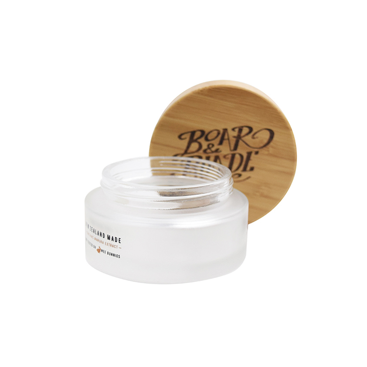 China manufacturer 100g clear frosted glass cosmetic cream empty jars with bamboo wood lids