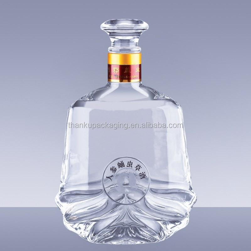 elegant shapes of glass bottle for vodka tequila gin cocktail