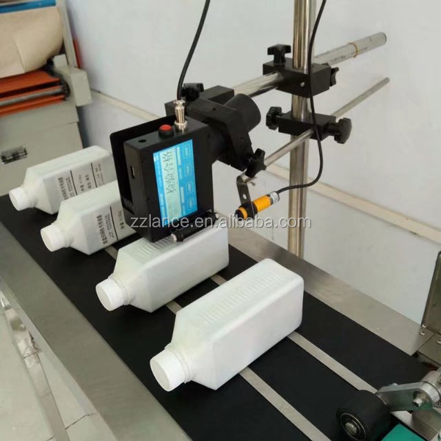 Portable hand-held laser code printer/batch expiry date printing machine with conveyor and stand for sale
