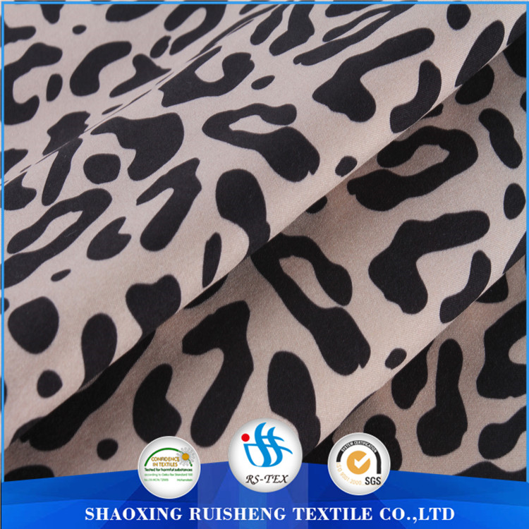 printing leopard design softshell fabrics: stretch fabric bonded TPU film bonded fleece