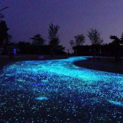 Blue glow paving stone in night glow in the dark pebble stone