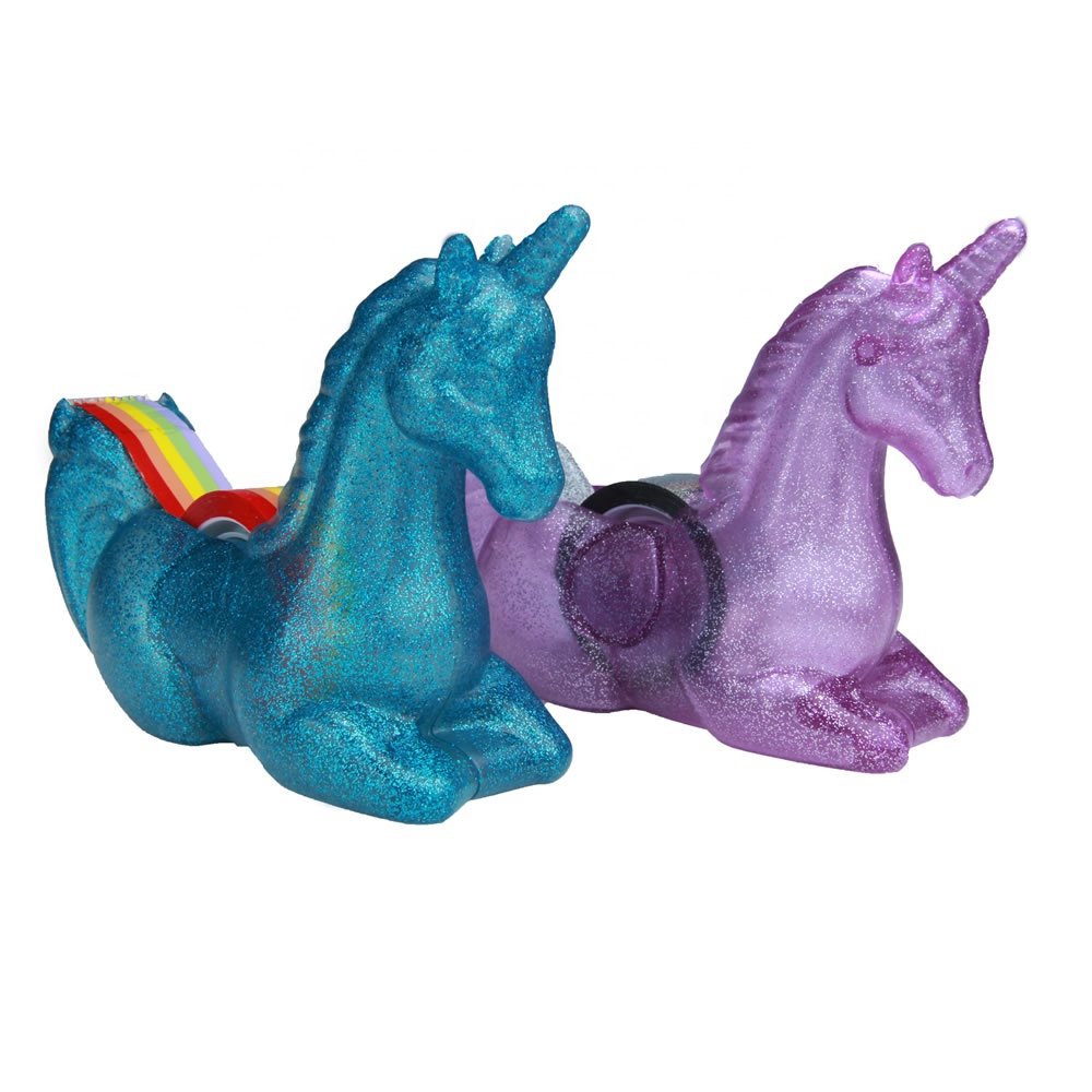 Desktop unicorn office supplies with rainbow tape