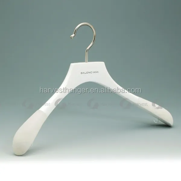 white glossy wood coat hanger with velvet shoulder