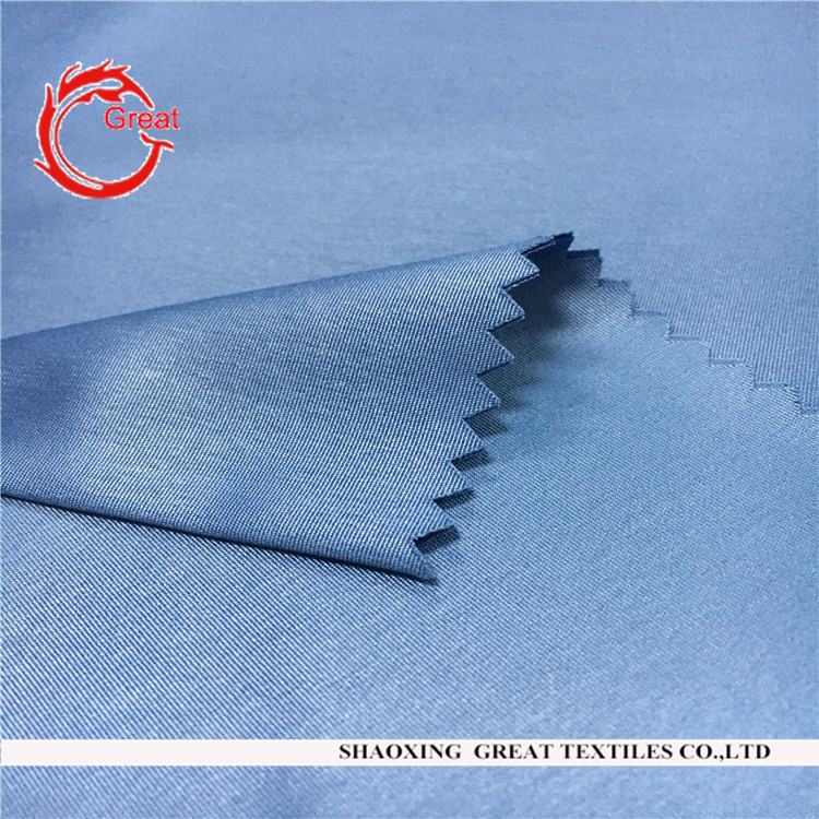 Good quality shaoxing textile fabric 100% polyester peach skin shinning fabric