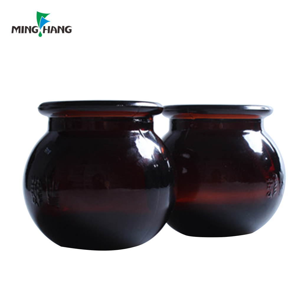 Hand made amber glass jar candle holders for home decoration