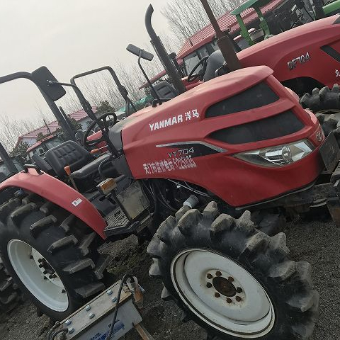 Подержанный трактор YANMAR 704