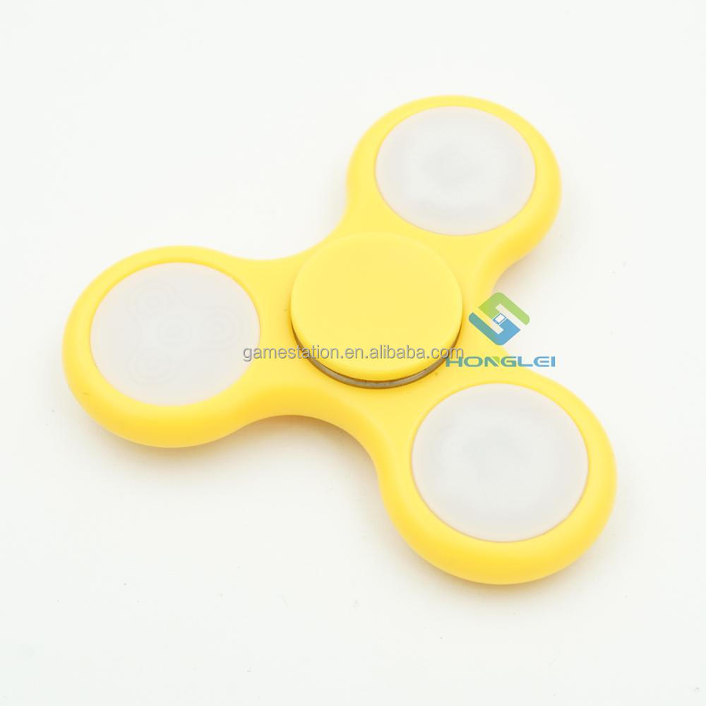Горячие продажи пластиковых руку Spinner игрушки палец Непоседа счетчик с изменение цвета солнечного ветра счетчик спираль света