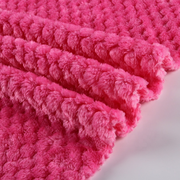 High quality widely used pink embossed coral fleece fabric for blanket